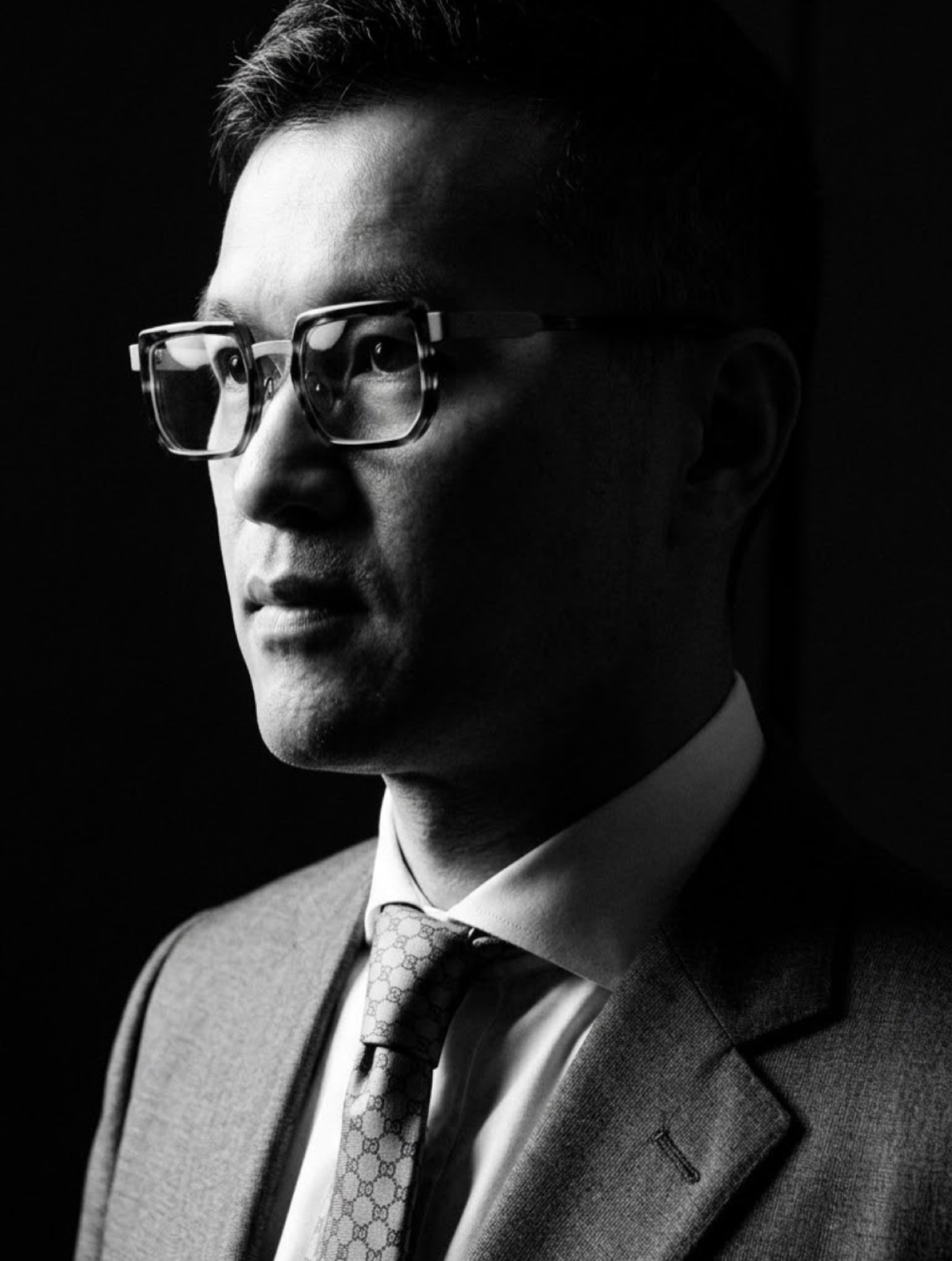 Black and white portrait of Ivan C.K. Yeung